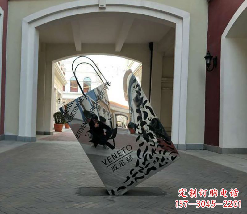 东莞不锈钢镂空购物袋雕塑——艺术精美的装饰品