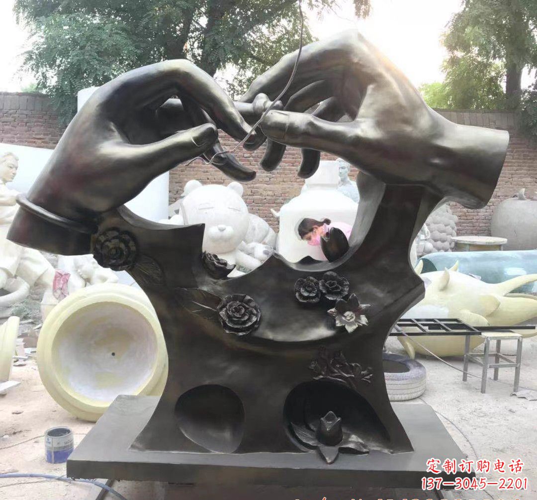 东莞戴戒指景观铜雕