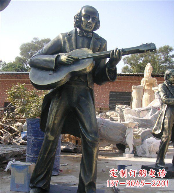 东莞公园弹吉他的西方男人人物铜雕