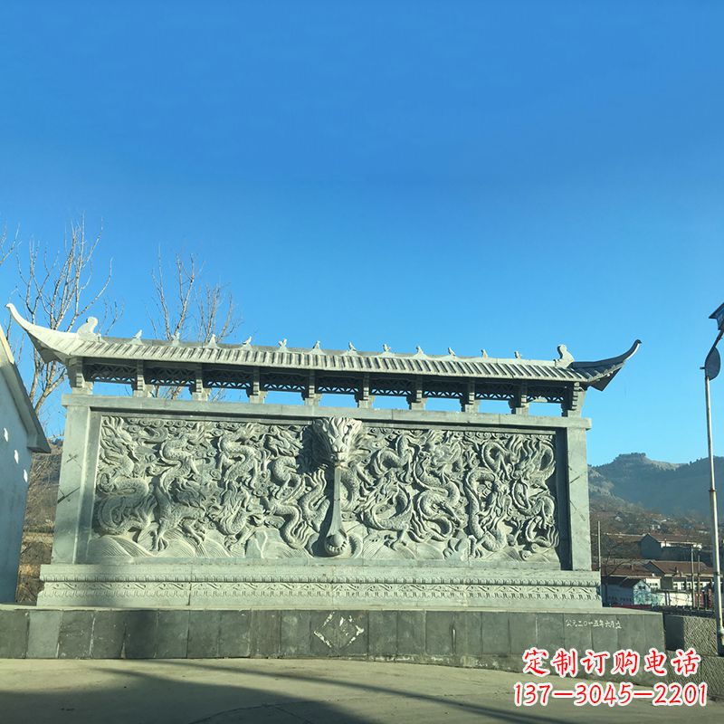 东莞青石九龙壁，精美雕塑饰衬城市广场