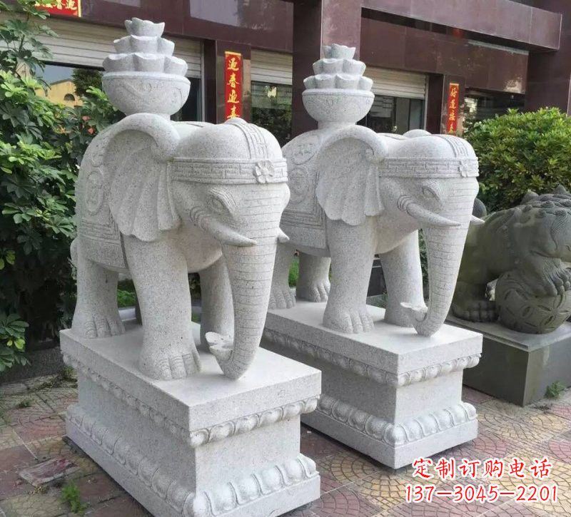 东莞驮元宝的大象石雕