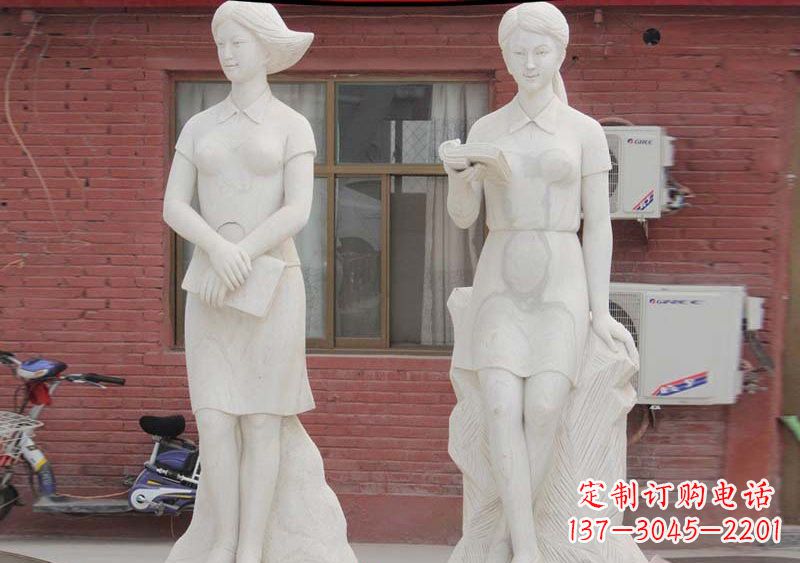 东莞校园拿书本的学生石雕